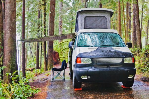 camper van in forest 3e907eec